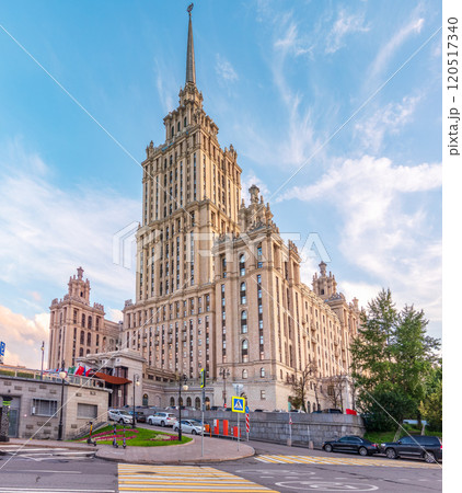 high-rise stalinist building near river at summer sunset in Moscow, Russia. Historic name is Hotel Ukraine. high-rise stalinist building near river at summer sunset in Moscow, Russia. Historic name is Hotel Ukraine. 120517340