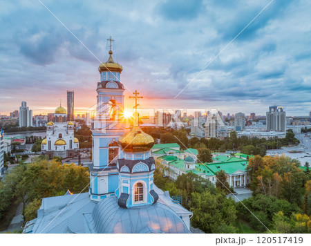Summer Yekaterinburg, Temple of the Ascension and Temple on Blood in beautiful clear sunset. Summer Yekaterinburg, Temple of the Ascension and Temple on Blood in beautiful clear sunset. 120517419