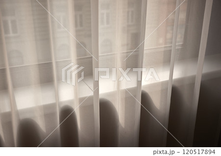 Window curtain in a plain hotel room Window curtain in a plain hotel room 120517894