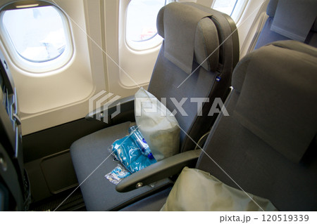 STOCKHOLM, SWEDEN - NOVEMBER 24, 2018: Economy Class aircraft seat in a long-haul cabin on the way to the USA 120519339