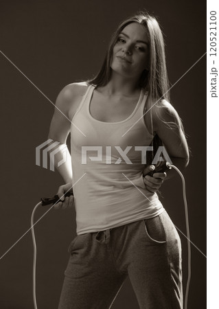 Fit woman with jumping rope 120521100