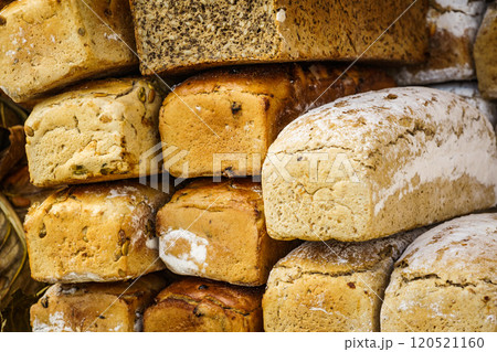 Many rustic fresh bread loaves 120521160