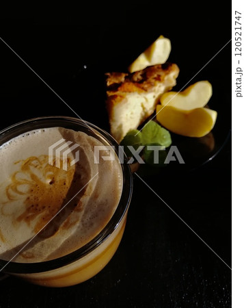 Сup of coffee tea on the table with a homemade cake decorated with a fresh mint 120521747