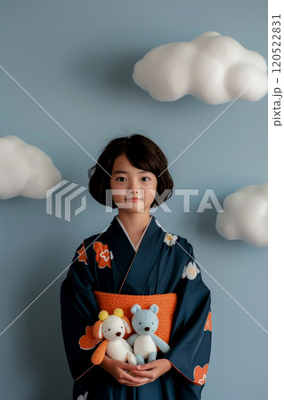 Vertical poster with a girl in a kimono holding Amigurumi style toys in her hands Vertical poster with a girl in a kimono holding Amigurumi style toys in her hands 120522831