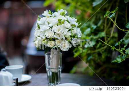 Wedding bouquet standing on the table Wedding bouquet standing on the table 120523094