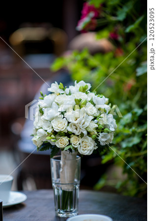 Wedding bouquet standing on the table 120523095
