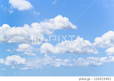 White clouds in a bright blue sky. The beauty of the nature White clouds in a bright blue sky. The beauty of the nature 120523401