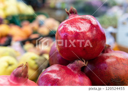 fresh food closeup background ripe market organic pomegranate vegetarian red healthy juicy fruit 120524455