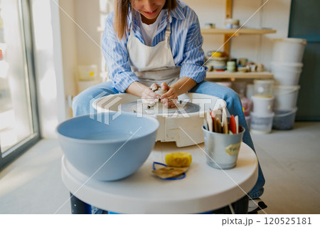 Explore artisan pottery and wheel throwing in a studio that encourages creativity and learning 120525181