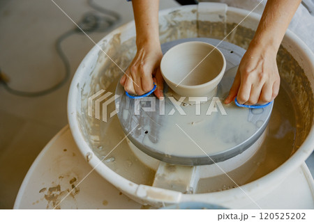 Pottery Making Crafting a Beautiful Ceramic Bowl on a Spinning Wheel with Careful Techniques 120525202