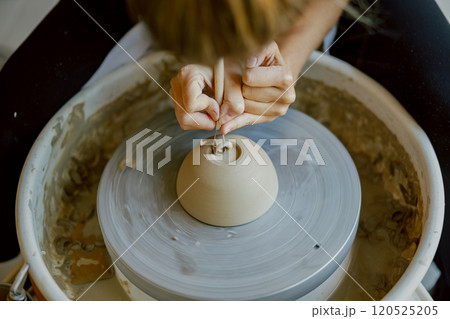 Artisan Pottery in Action Discovering the Craft of Creating a Unique Ceramic Piece from Clay 120525205
