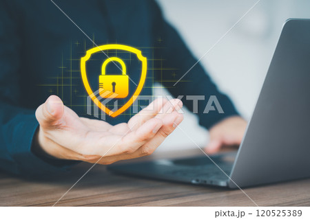 Protection network security computer and safe your data concept, user show shield protect icon for security protection, displaying on a virtual screen. Protection network security computer and safe your data concept, user show shield protect icon for security protection, displaying on a virtual screen. 120525389