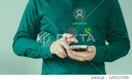 Concept of scam, fraud with a mobile phone from the criminal. Man answering the incoming call. Phone call was from an unknown number. Call center gang or stranger. Hoax person with a fake identity. Concept of scam, fraud with a mobile phone from the criminal. Man answering the incoming call. Phone call was from an unknown number. Call center gang or stranger. Hoax person with a fake identity. 120525390
