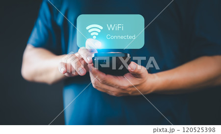 While using a mobile phone, a man faces difficulties connecting to WiFi, encountering either connection issues or incorrect password, leading to a delay in loading digital data from websites. While using a mobile phone, a man faces difficulties connecting to WiFi, encountering either connection issues or incorrect password, leading to a delay in loading digital data from websites. 120525398