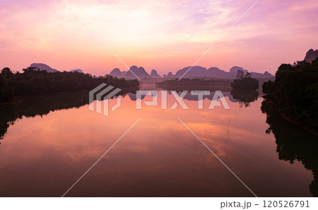 Majestic sunset clouds sky over lake landscape,Amazing colorful light of nature cloudscape sunset or sunrise sky background 120526791