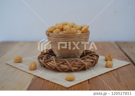 a traditional cake from Indonesia called kue sus filled with cream puffs a traditional cake from Indonesia called kue sus filled with cream puffs 120527851