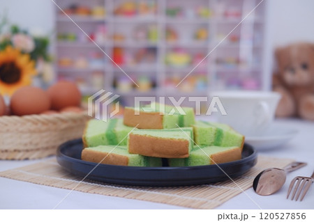 pandan cake on black plate. Selective focus. pandan cake on black plate. Selective focus. 120527856