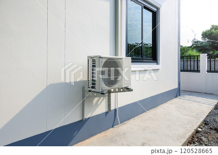 Condenser unit outside home. 120528665