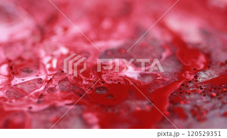Acrylic color mix. Glitter fluid spill. Defocused white red shimmering sequin particles liquid ink swirl pigment dye blend abstract art background. 120529351