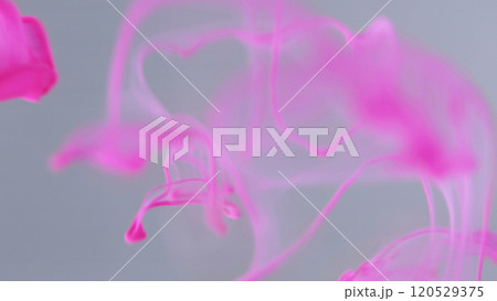 Color water. Gleaming splashes. Pink graphic bright gradient falling flow on modern white art abstract background. Sparkling liquid fluid. 120529375