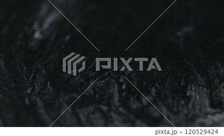 Glitter assortment. Pigment splash. Gel flows. Defocused white black silver color gleaming flakes texture paint fluid abstract art modern background. 120529424