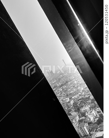 Glass windows in high-rise condos offer views of buildings. 120531450