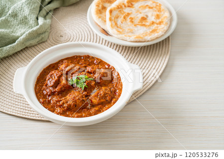 chicken tikka masala spicy curry meat food with roti or naan bread chicken tikka masala spicy curry meat food with roti or naan bread 120533276