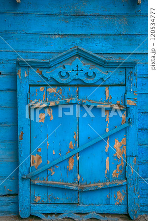 Wooden window shutters 120534777