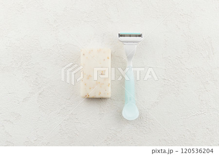 High-quality razor showcased on a sophisticated white backdrop. Grooming routine with style and precision High-quality razor showcased on a sophisticated white backdrop. Grooming routine with style and precision 120536204