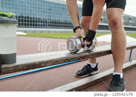 Preparing for Intense Workout at Outdoor Gym 120542179