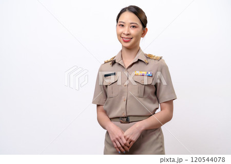 Young Thai Asian Teacher in the uniform standing and smiling to the camera 120544078