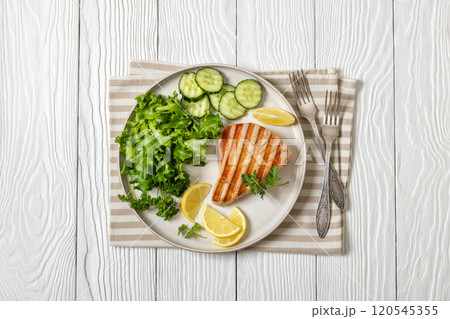 grilled tuna steak on a plate, top view grilled tuna steak on a plate, top view 120545355