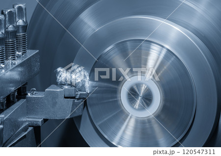 Closeup scene the lathe machine finish cut the metal parts in the light blue scene. 120547311