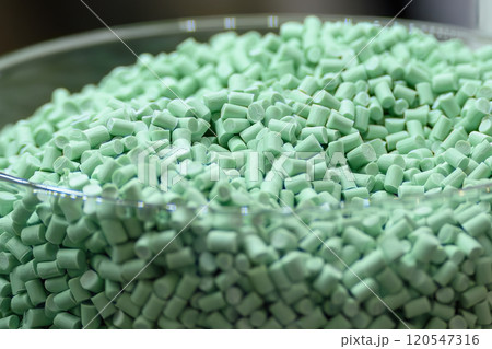 Close up scene the green pigment material for injection process. Close up scene the green pigment material for injection process. 120547316