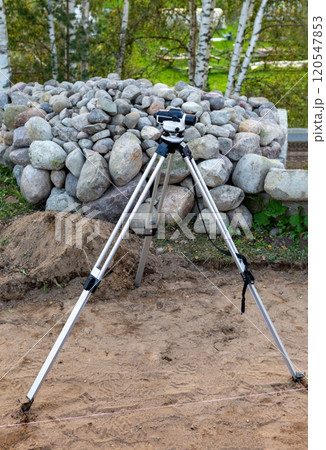 Surveyor equipment, theodolite on the construction site. Surveyor equipment, theodolite on the construction site. 120547853