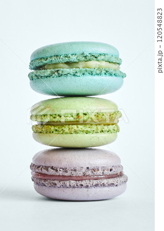 Stack of three colorful French Macarons, macaroons cakes with different flavors Stack of three colorful French Macarons, macaroons cakes with different flavors 120548823