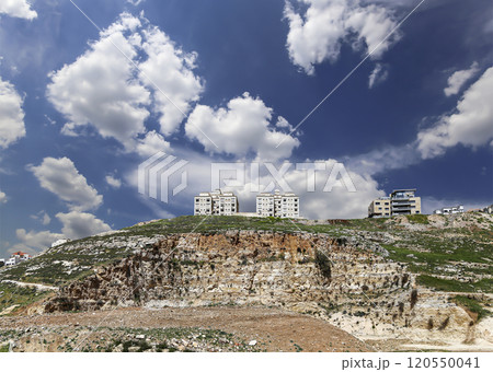 Amman city landmarks-- old roman Citadel Hill, Jordan. Against the background of a beautiful sky with clouds Amman city landmarks-- old roman Citadel Hill, Jordan. Against the background of a beautiful sky with clouds 120550041