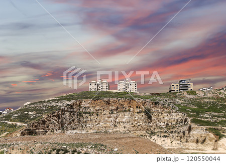 Amman city landmarks-- old roman Citadel Hill, Jordan. Against the background of a beautiful sky with clouds Amman city landmarks-- old roman Citadel Hill, Jordan. Against the background of a beautiful sky with clouds 120550044
