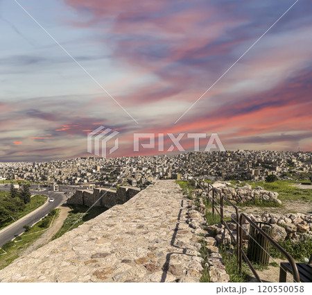 Amman city landmarks-- old roman Citadel Hill, Jordan. Against the background of a beautiful sky with clouds 120550058