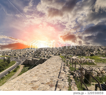 Amman city landmarks-- old roman Citadel Hill, Jordan. Against the background of a beautiful sky with clouds 120550059