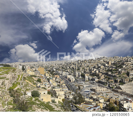 Amman city landmarks-- old roman Citadel Hill, Jordan. Against the background of a beautiful sky with clouds Amman city landmarks-- old roman Citadel Hill, Jordan. Against the background of a beautiful sky with clouds 120550065