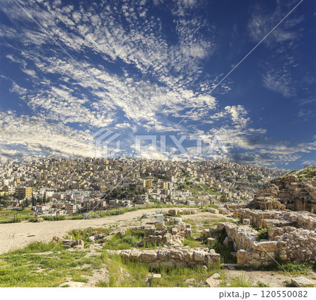 Amman city landmarks-- old roman Citadel Hill, Jordan. Against the background of a beautiful sky with clouds 120550082