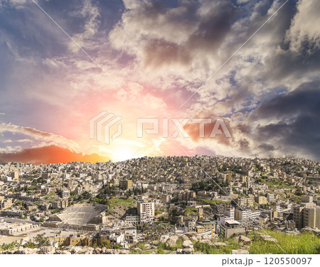 Amman city landmarks-- old roman Citadel Hill, Jordan. Against the background of a beautiful sky with clouds Amman city landmarks-- old roman Citadel Hill, Jordan. Against the background of a beautiful sky with clouds 120550097