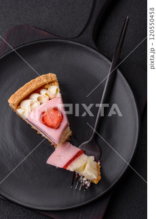 Sweet cheesecake with mascarpone or Philadelphia cheese, jelly and strawberries Sweet cheesecake with mascarpone or Philadelphia cheese, jelly and strawberries 120550458