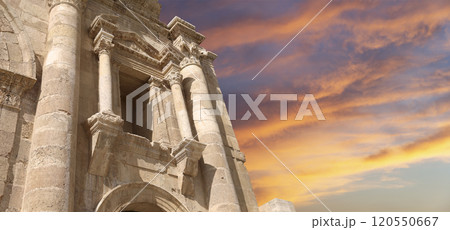 Arch of Hadrian in Gerasa (Jerash)-- was built to honor the visit of emperor Hadrian to Jerash in 129/130 AD, Jordan. Against the background of a beautiful sky with clouds Arch of Hadrian in Gerasa (Jerash)-- was built to honor the visit of emperor Hadrian to Jerash in 129/130 AD, Jordan. Against the background of a beautiful sky with clouds 120550667