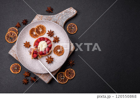 Sweet tartlet with raspberries and cream 120550868