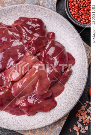 Fresh raw chicken or beef liver with salt, spices and herbs Fresh raw chicken or beef liver with salt, spices and herbs 120551303