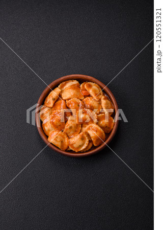 Ravioli with meat or vegetarian with ricotta, salt and spices 120551321