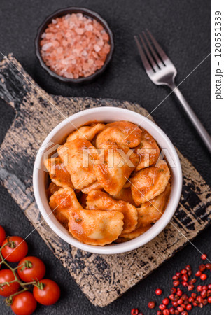 Ravioli with meat or vegetarian with ricotta, salt and spices 120551339