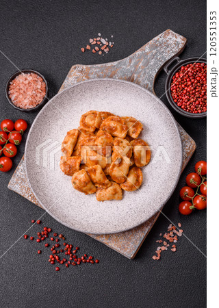 Ravioli with meat or vegetarian with ricotta, salt and spices Ravioli with meat or vegetarian with ricotta, salt and spices 120551353